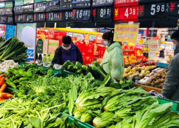 COVID-19 podría haberse propagado en mercado Wuhan pero originado en otros lugares